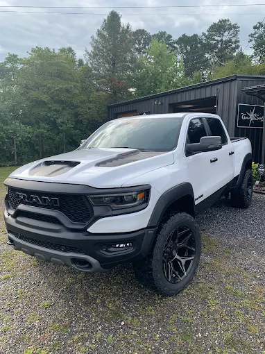 White Ram TRX pickup with dark tinted windows at the True South shop